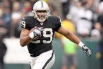 OAKLAND, CA - DECEMBER 18:  Michael Bush #29 of the Oakland Raiders in action against the Detroit Lions at O.co Coliseum on December 18, 2011 in Oakland, California.  (Photo by Ezra Shaw/Getty Images)