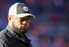 DENVER, CO - JANUARY 08:  Head coach Mike Tomlin of the Pittsburgh Steelers looks on prior to the start of the AFC Wild Card Playoff game against the Denver Broncos at Sports Authority Field at Mile High on January 8, 2012 in Denver, Colorado.  (Photo by Jeff Gross/Getty Images)