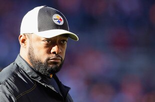 DENVER, CO - JANUARY 08:  Head coach Mike Tomlin of the Pittsburgh Steelers looks on prior to the start of the AFC Wild Card Playoff game against the Denver Broncos at Sports Authority Field at Mile High on January 8, 2012 in Denver, Colorado.  (Photo by Jeff Gross/Getty Images)