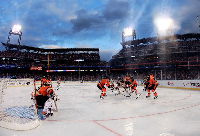 PHILADELPHIA, PA - JANUARY 02: The Philadelphia Flyers defend their net against the New York Rangers during the 2012 Bridgestone NHL Winter Classic at Citizens Bank Park on January 2, 2012 in Philadelphia, Pennsylvania. The Rangers won 3-2 in regulation. (Photo by Rob Carr/Getty Images)