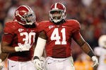 TUSCALOOSA, AL - OCTOBER 22:  Dont'a Hightower #30 and Courtney Upshaw #41 of the Alabama Crimson Tide react after a defensive stop against the Tennessee Volunteers at Bryant-Denny Stadium on October 22, 2011 in Tuscaloosa, Alabama.  (Photo by Kevin C. Cox/Getty Images)
