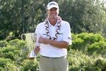 KAPALUA, HI - JANUARY 09:  Steve Stricker holds the trophy after winning the Hyundai Tournament of Champions at the Plantation Course on January 9, 2012 in Kapalua, Hawaii.  (Photo by Sam Greenwood/Getty Images)
