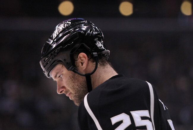 LOS ANGELES, CA - DECEMBER 26:  Dustin Penner #25 of the Los Angeles Kings looks on prior to a face-off during the NHL game against the Phoenix Coyotes at Staples Center on December 26, 2011 in Los Angeles, California.  (Photo by Victor Decolongon/Getty Images)