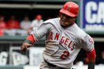 BALTIMORE, MD - SEPTEMBER 18:  Eric Aybar #2 of the Los Angeles Angels of Anaheim runs to third base during a baseball game against the Baltimore Orioles at Oriole Park at Camden Yards on September 18, 2011 in Baltimore, Maryland. The Angels beat the Orioles 11-2. (Photo by Steve Ruark/Getty Images)