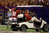 NEW ORLEANS, LA - JANUARY 09:  C.J. Mosley #32 of the Alabama Crimson Tide waves as he is carted off of the field after he was injured while playing against the Louisiana State University Tigers during the 2012 Allstate BCS National Championship Game at Mercedes-Benz Superdome on January 9, 2012 in New Orleans, Louisiana.  (Photo by Chris Graythen/Getty Images)
