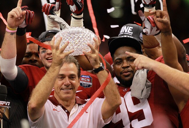 NEW ORLEANS, LA - JANUARY 09:  Head coach Nick Saban of the Alabama Crimson Tide celebrates with the trophy after defeating Louisiana State University Tigers in the 2012 Allstate BCS National Championship Game at Mercedes-Benz Superdome on January 9, 2012 in New Orleans, Louisiana.  (Photo by Ronald Martinez/Getty Images)