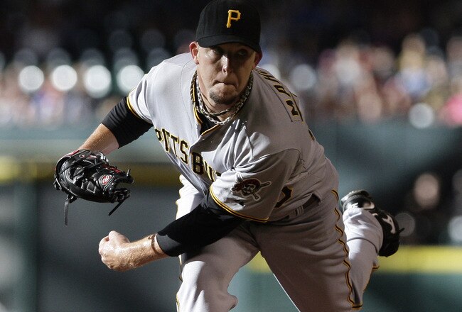 HOUSTON,TX- JULY 16: Starting pitcher Paul Maholm #28  of the Pittsburgh Pirates pitches in the first inning against  the Houston Astros on July 16, 2011 at Minute Maid Park in Houston, Texas. (Photo by Thomas B. Shea/Getty Images)