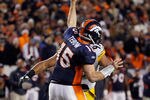 DENVER, CO - JANUARY 08:  Quarterback Tim Tebow #15 of the Denver Broncos throws a pass during the AFC Wild Card Playoff game at Sports Authority Field against the Pittsburgh Steelers at Mile High on January 8, 2012 in Denver, Colorado.  (Photo by Jeff Gross/Getty Images)