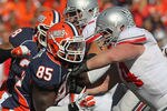 CHAMPAIGN, IL - OCTOBER 15: Whitney Mercilus #85 of the Illinois Fighting Illini rushes against Jack Mewhort #74 of the Ohio State Buckeyes at Memorial Stadium on October 15, 2011 in Champaign, Illinois. Ohio State defeated Illinois 17-7. (Photo by Jonathan Daniel/Getty Images)