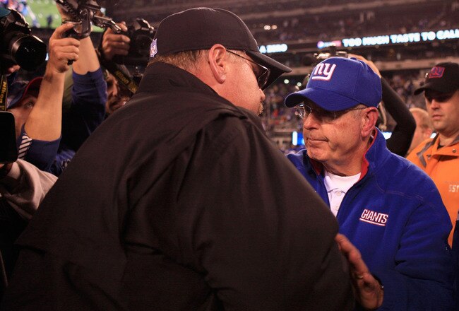 EAST RUTHERFORD, NJ - NOVEMBER 20:  Head coach Andy Reid of the Philadelphia Eagles is congratulated by head coach Tom Coughlin of the New York Giants after the Eagles won 17-10 at MetLife Stadium on November 20, 2011 in East Rutherford, New Jersey.  (Photo by Patrick McDermott/Getty Images)