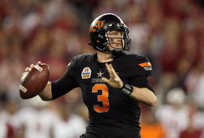 GLENDALE, AZ - JANUARY 02:  Brandon Weeden #3 of the Oklahoma State Cowboys throws a pass against the Stanford Cardinal during the Tostitos Fiesta Bowl on January 2, 2012 at University of Phoenix Stadium in Glendale, Arizona.  (Photo by Donald Miralle/Getty Images)