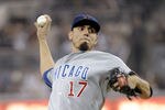 SAN DIEGO, CA - SEPTEMBER 27:  Matt Garza #17 of the Chicago Cubs pitches during the first inning of a baseball game against the San Diego Padres at Petco Park on September 27, 2011 in San Diego, California.  (Photo by Denis Poroy/Getty Images)