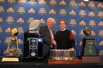 NEW ORLEANS, LA - JANUARY 10:  Mal Moore the Athletic Director of the University of Alabama and Head coach Nick Saban of the Alabama Crimson Tide stand next to all the trophies awarded to Alabama as the national champion after defeating Louisiana State University Tigers in the 2012 Allstate BCS National Championship Game during a press conference on January 10, 2012 in New Orleans, Louisiana.  (Photo by Andy Lyons/Getty Images)