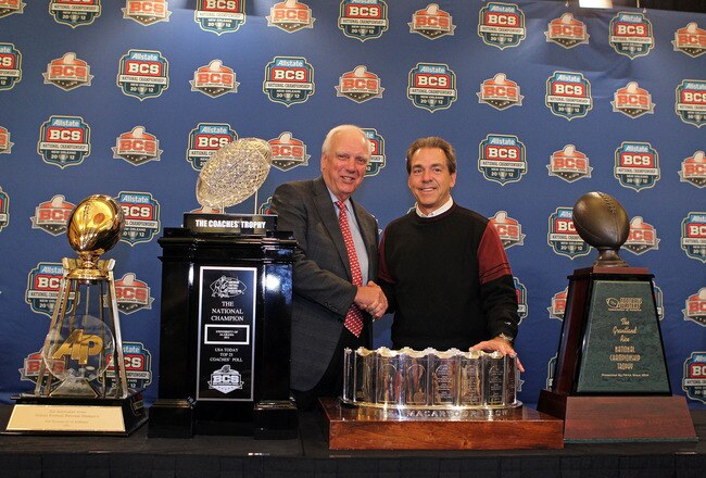 NEW ORLEANS, LA - JANUARY 10:  Mal Moore the Athletic Director of the University of Alabama and Head coach Nick Saban of the Alabama Crimson Tide stand next to all the trophies awarded to Alabama as the national champion after defeating Louisiana State University Tigers in the 2012 Allstate BCS National Championship Game during a press conference on January 10, 2012 in New Orleans, Louisiana.  (Photo by Andy Lyons/Getty Images)