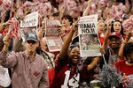 NEW ORLEANS, LA - JANUARY 09:  Fans of the Alabama Crimson Tide celebrate after defeating Louisiana State University Tigers in the 2012 Allstate BCS National Championship Game at Mercedes-Benz Superdome on January 9, 2012 in New Orleans, Louisiana. Alabama  won the game by a score of 21-0.  (Photo by Kevin C. Cox/Getty Images)