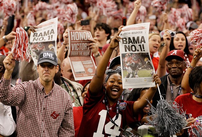 NEW ORLEANS, LA - JANUARY 09:  Fans of the Alabama Crimson Tide celebrate after defeating Louisiana State University Tigers in the 2012 Allstate BCS National Championship Game at Mercedes-Benz Superdome on January 9, 2012 in New Orleans, Louisiana. Alabama  won the game by a score of 21-0.  (Photo by Kevin C. Cox/Getty Images)