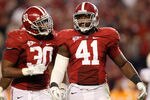 TUSCALOOSA, AL - OCTOBER 22:  Dont'a Hightower #30 and Courtney Upshaw #41 of the Alabama Crimson Tide react after a defensive stop against the Tennessee Volunteers at Bryant-Denny Stadium on October 22, 2011 in Tuscaloosa, Alabama.  (Photo by Kevin C. Cox/Getty Images)