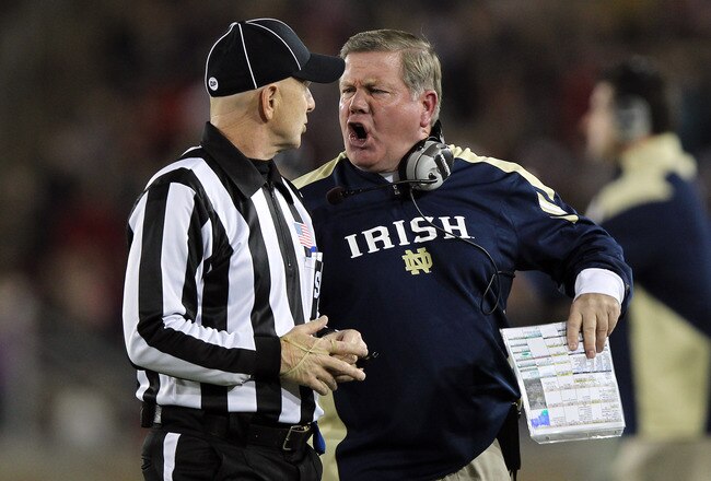 STANFORD, CA - NOVEMBER 26: Notre Dame Fighting Irish head coach Brian Kelly argues a call with side judge Glenn Crowther during their game against the Stanford Cardinal at Stanford Stadium on November 26, 2011 in Stanford, California.  (Photo by Ezra Shaw/Getty Images)