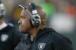 GREEN BAY, WI - DECEMBER 11: Head coach Hue Jackson of the Oakland Raiders looks on during the game against the Green Bay Packers at Lambeau Field on December 11, 2011 in Green Bay, Wisconsin. (Photo by Scott Boehm/Getty Images)