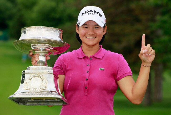 PITTSFORD, NY - JUNE 26:  Yani Tseng of Taiwan poses with the winner's trophy after her ten-stroke victory at the Wegmans LPGA Championship at Locust Hill Country Club on June 26, 2011 in Pittsford, New York.  (Photo by Scott Halleran/Getty Images)