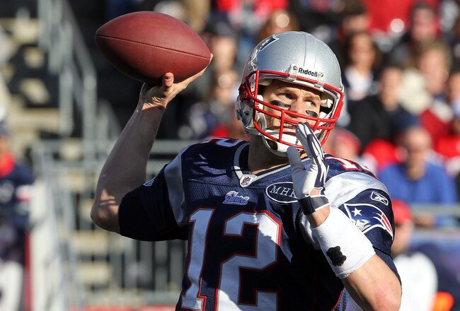 FOXBORO, MA - JANUARY 1:   Tom Brady #12 of the New England Patriots throws against the Buffalo Bills at Gillette Stadium on January 1, 2012 in Foxboro, Massachusetts. (Photo by Jim Rogash/Getty Images)