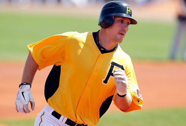 BRADENTON, FL - MARCH 13:  Outfielder John Bowker #14 of the Pittsburgh Pirates rounds the bases after his home run against the Boston Red Sox during a Grapefruit League Spring Training Game at McKechnie Field on March 13, 2011 in Bradenton, Florida.  (Photo by J. Meric/Getty Images)