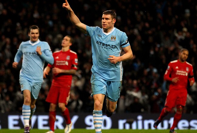 MANCHESTER, ENGLAND - JANUARY 03:  James Milner of Manchester City celebrates scoring his team's third goal, from a penalty kick, during the Barclays Premier League match between Manchester City and Liverpool at the Etihad Stadium on January 3, 2012 in Manchester, England. (Photo by Clive Mason/Getty Images)