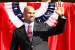 ANAHEIM, CA - DECEMBER 10:  Albert Pujols waves as he takes the stage at a public press conference introducing newly signed Los Angeles Angels of Anaheim  players Albert Pujols and C.J. Wilson at Angel Stadium on December 10, 2011 in Anaheim, California.  (Photo by Stephen Dunn/Getty Images)