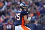 DENVER, CO - JANUARY 08:  Quarterback Tim Tebow #15 of the Denver Broncos drops back to pass during the AFC Wild Card Playoff game at Sports Authority Field against the Pittsburgh Steelers at Mile High on January 8, 2012 in Denver, Colorado.  (Photo by Jeff Gross/Getty Images)