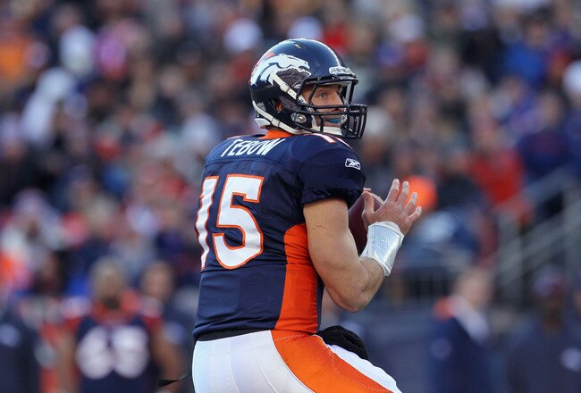 DENVER, CO - JANUARY 08:  Quarterback Tim Tebow #15 of the Denver Broncos drops back to pass during the AFC Wild Card Playoff game at Sports Authority Field against the Pittsburgh Steelers at Mile High on January 8, 2012 in Denver, Colorado.  (Photo by Jeff Gross/Getty Images)