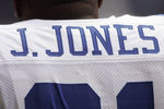 IRVING, TX - NOVEMBER 20:  A detailed view of the back of the jersey of runningback Julius Jones #21 of the Dallas Cowboys as Jones looks on from the sideline during their game against the Detroit Lions on November 20, 2005 at Texas Stadium in Irving, Texas.  The Cowboys defeated the Lions 20-7.  (Photo by Ronald Martinez/Getty Images)