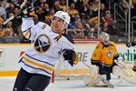 NASHVILLE, TN - DECEMBER 03: Derek Roy #9 of the Buffalo Sabres celebrates the game wining goal against Anders Lindback #39 of the Nashville Predators at the Bridgestone Arena on December 3, 2011 in Nashville, Tennessee.  (Photo by Frederick Breedon/Getty Images)