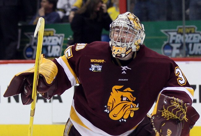 ST. PAUL, MN - APRIL 09:  Kenny Reiter #35 of the Minnesota Duluth Bulldogs celebrates the win over the the Michigan Wolverines during the championship game of the 2011 NCAA Men's Frozen Four on April 9, 2011 at the Xcel Energy Center in St. Paul, Minnesota. The Minnesota Duluth Bulldogs defeated the Michigan Wolverines 3-2 in overtime.  (Photo by Elsa/Getty Images)