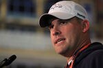 LONDON, ENGLAND - OCTOBER 29:  Head coach of the Denver Broncos Josh McDaniels speaks to the media during a press conference prior to the start of a team training session at The Brit Oval on October 29, 2010 in London, England. The Denver Broncos will play the San Francisco 49ers at Wembley Stadium on October 31.  (Photo by Chris McGrath/Getty Images)