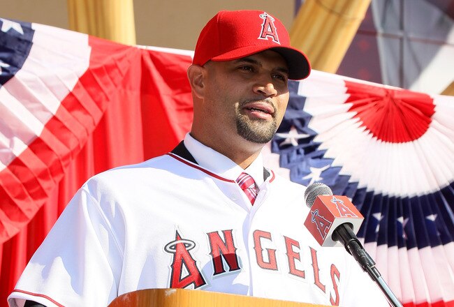 ANAHEIM, CA - DECEMBER 10:  Albert Pujols speaks at a public press conference introducing newly signed Los Angeles Angels of Anaheim  players Pujols and C.J. Wilson at Angel Stadium on December 10, 2011 in Anaheim, California.  (Photo by Stephen Dunn/Getty Images)