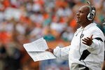 MIAMI GARDENS, FL - DECEMBER 04:  Oakland Raiders head coach Hue Jackson looks on during a game against the Miami Dolphins at Sun Life Stadium on December 4, 2011 in Miami Gardens, Florida.  (Photo by Mike Ehrmann/Getty Images)