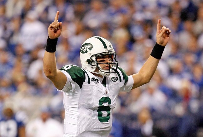 INDIANAPOLIS - DECEMBER 27:  Mark Sanchez #8 of the New York Jets celebrates a touchdown during the NFL game against the Indianapolis Colts at Lucas Oil Stadium on December 27, 2009 in Indianapolis, Indiana. Peyton Manning and many of the Colts starters  were pulled from the game in the second half and the Colts went on to lose their first game of the season 29-15.  (Photo by Andy Lyons/Getty Images)
