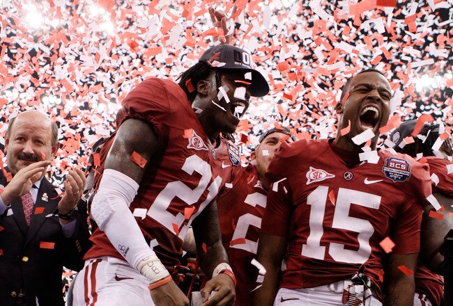 NEW ORLEANS, LA - JANUARY 09:  Dre Kirkpatrick #21 and Darius Hanks #15 of the Alabama Crimson Tide celebrate after defeating Louisiana State University Tigers in the 2012 Allstate BCS National Championship Game at Mercedes-Benz Superdome on January 9, 2012 in New Orleans, Louisiana. Alabama  won the game by a score of 21-0.  (Photo by Andy Lyons/Getty Images)