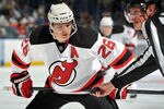 UNIONDALE, NY - SEPTEMBER 24: Patrik Elias #26 of the New Jersey Devils prepares for a face off during the third period of a preseason game against the New York Islanders at Nassau Coliseum on September 24, 2011 in Uniondale, New York. (Photo by Christopher Pasatieri/Getty Images for New York Islanders)