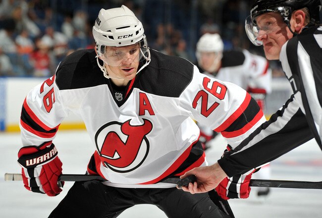 UNIONDALE, NY - SEPTEMBER 24: Patrik Elias #26 of the New Jersey Devils prepares for a face off during the third period of a preseason game against the New York Islanders at Nassau Coliseum on September 24, 2011 in Uniondale, New York. (Photo by Christopher Pasatieri/Getty Images for New York Islanders)
