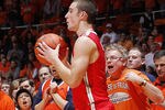 CHAMPAIGN, IL - JANUARY 10: Aaron Craft #4 of the Ohio State Buckeyes takes the ball out of bounds while being taunted by Illinois Fighting Illini fans at Assembly Hall on January 10, 2012 in Champaign, Illinois. The Illini defeated the Buckeyes 79-74. (Photo by Joe Robbins/Getty Images)