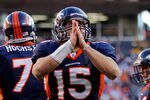 DENVER, CO - JANUARY 08:  Tim Tebow #15 of the Denver Broncos celebrates after running the ball in the end zone for a touchdown in the second quarter against the Pittsburgh Steelers during the AFC Wild Card Playoff game at Sports Authority Field at Mile High on January 8, 2012 in Denver, Colorado.  (Photo by Justin Edmonds/Getty Images)