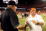MIAMI - OCTOBER 12:  Head coach Rex Ryan of the New York Jets congratulates head coach Tony Sparano of the Miami Dolphins at Land Shark Stadium on October 12, 2009 in Miami, Florida. The Dolphins defeated the Jets 31-27.  (Photo by Doug Benc/Getty Images)