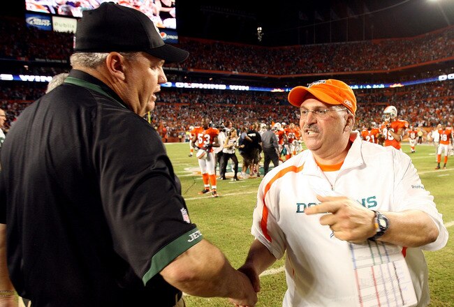 MIAMI - OCTOBER 12:  Head coach Rex Ryan of the New York Jets congratulates head coach Tony Sparano of the Miami Dolphins at Land Shark Stadium on October 12, 2009 in Miami, Florida. The Dolphins defeated the Jets 31-27.  (Photo by Doug Benc/Getty Images)