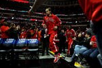 CHICAGO, IL - MAY 26:  Joakim Noah #13 of the Chicago Bulls runs out to the court from the locker room to play against the Miami Heat in Game Five of the Eastern Conference Finals during the 2011 NBA Playoffs on May 26, 2011 at the United Center in Chicago, Illinois. The Heat won 83-80. NOTE TO USER: User expressly acknowledges and agrees that, by downloading and or using this photograph, User is consenting to the terms and conditions of the Getty Images License Agreement.  (Photo by Mike Ehrmann/Getty Images)