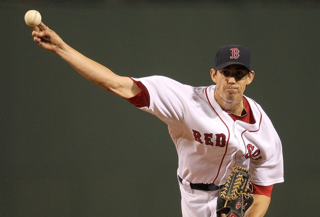 BOSTON, MA - SEPTEMBER 15:  Kyle Weiland #70 of the Boston Red Sox throws against the Tampa Bay Rays in the first inning at Fenway Park September 15, 2011 in Boston, Massachusetts. (Photo by Jim Rogash/Getty Images)