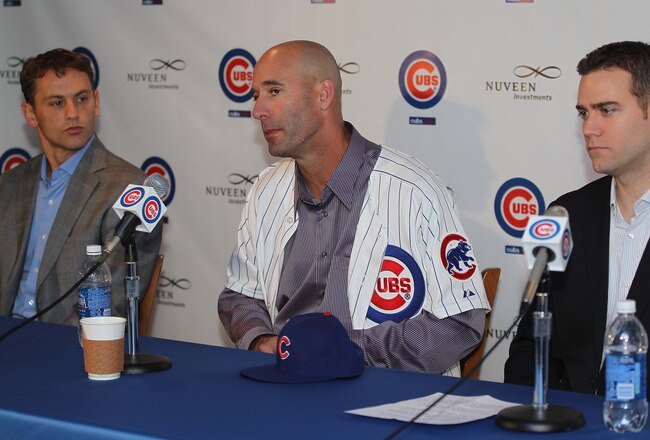 CHICAGO, IL - NOVEMBER 18: Dale Sveum, the new manager of the Chicago Cubs, speaks during a press conference as general manager Jed Hoyer (L) and president Theo Epstein listen at Wrigley Field on November 18, 2011 in Chicago, Illinois. (Photo by Jonathan Daniel/Getty Images)