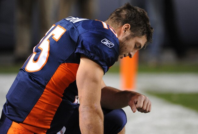 DENVER, CO - NOVEMBER 17: Tim Tebow #15 of the Denver Broncos prays prior to the game against the New York Jets at Sports Authority Field at Mile High on November 17, 2011 in Denver, Colorado.  (Photo by Garrett W. Ellwood/Getty Images)