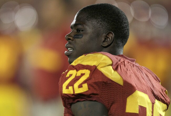 LOS ANGELES, CA - NOVEMBER 26:  Running back Curtis McNeal #22 of the USC Trojans gets ready for the game with the UCLA Bruins at the Los Angeles Memorial Coliseum on November 26, 2011 in Los Angeles, California.  (Photo by Stephen Dunn/Getty Images)