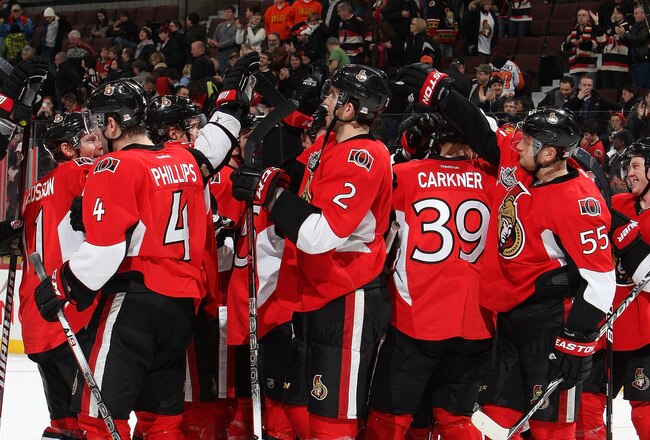 OTTAWA, CANADA - JANUARY 8: Members of the Ottawa Senators celebrate their 6-4 come from behind win against the Philadelphia Flyers at Scotiabank Place on January 8, 2012 in Ottawa, Ontario, Canada.  (Photo by Francois Laplante/Freestyle Photography/Getty Images)